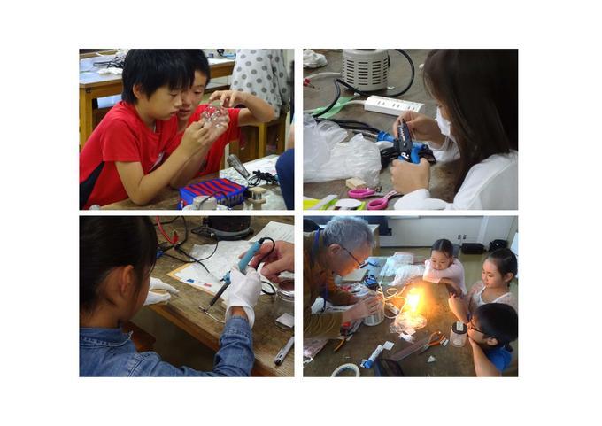 発明クラブ5年生Aクラスの子供たちが、どのような仕組みで電球が光っているのかを学んだあと電球作り体験をしている写真