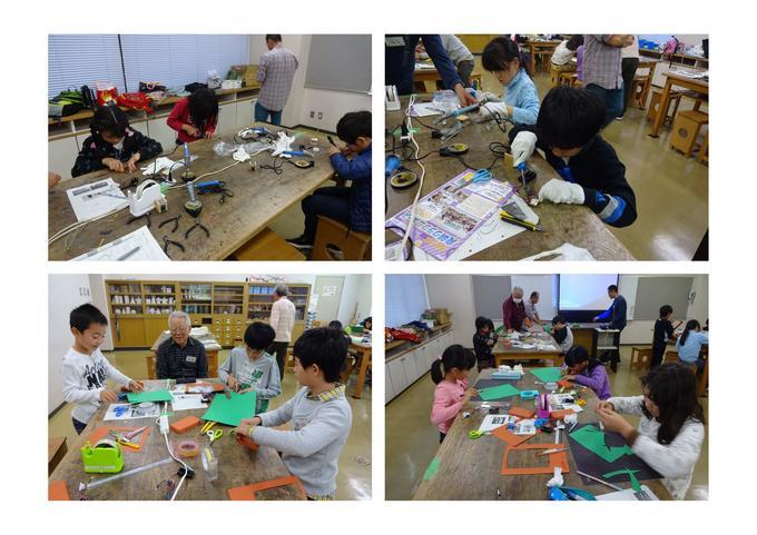 発明クラブ4年生Aクラスの子供たちが光センサーやLEDの働きについて学び電子回路製作体験をしている写真